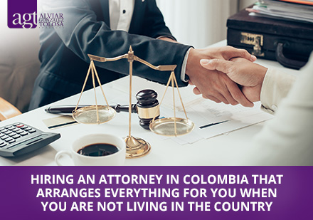 Colombian Attorney Shaking Hands with a Foreigner for Regulatory Services